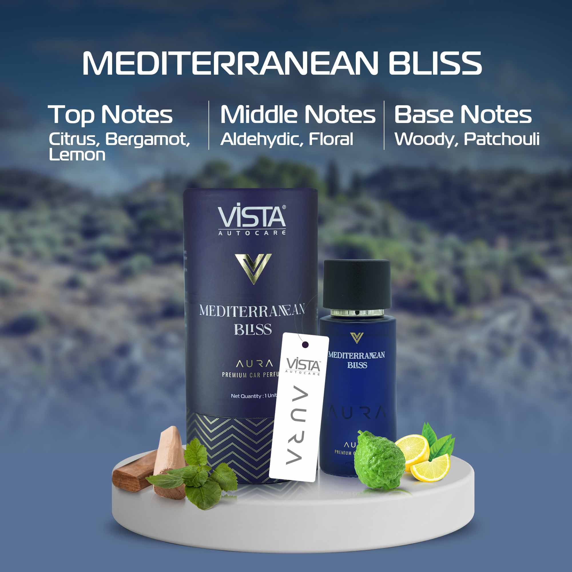 Vista AutoCare Mediterranean Bliss car air freshener with product details and natural elements on a blurred landscape background.